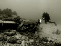My buddy swims around an upsidown zero from WWII in 30ft ... by Becky Kagan 